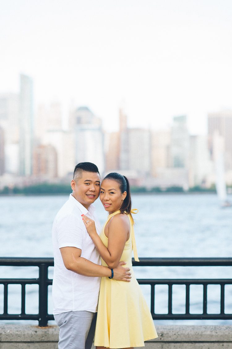 With the best view of the NYC skyline, these waterfront properties Liberty State Park along with Liberty House and Maritime Parc are popular wedding venues in Northern NJ. Jen and Ringo plus their adorable son joined us for their engagement session at Liberty State Park in Jersey City NJ. Captured by MJ from Pearl Paper Studio, NY and NJ Wedding Photography Studio.