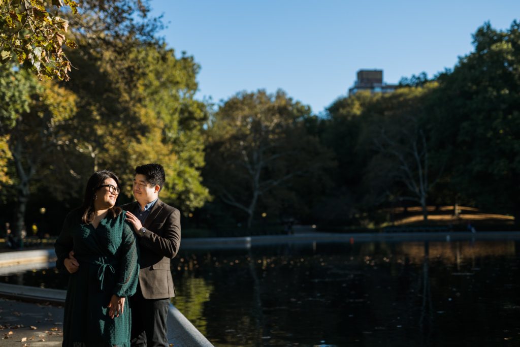 Early morning we met up by Bethesda Fountain with Lauren and Peter for their Central Park NY engagement session. Early morning light beaming down at Lauren and Peter we walked around peaceful and beautiful Central Park.  Central Park NY engagement with Lauren and Peter captured by Steve from Pearl Paper Studio. Pearl Paper Studio is here to capture real emotions, fun couples with non-traditional wedding stories, now we are booking small and intimate backyard wedding, outdoor tent wedding, farm wedding, elopements, nyc elopements. We are currently booking fall 2022 and 2023 weddings in NY, NJ and LI.