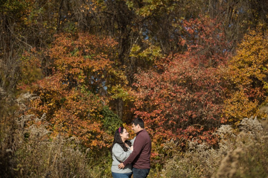 Grasping on to the last few colors of the Fall foliage at Watchung Mountain with Hayley and Zach along with their dog. Hayley and Zach's Watchung Reservation NJ engagement captured by Steve from Pearl Paper Studio. Pearl Paper Studio is here to capture real emotions, fun couples with non-traditional wedding stories, now we are booking small intimate backyard wedding, outdoor tent wedding, farm wedding, elopements, nyc elopements. We are currently booking fall 2022 and 2023 weddings in NY, NJ and LI.