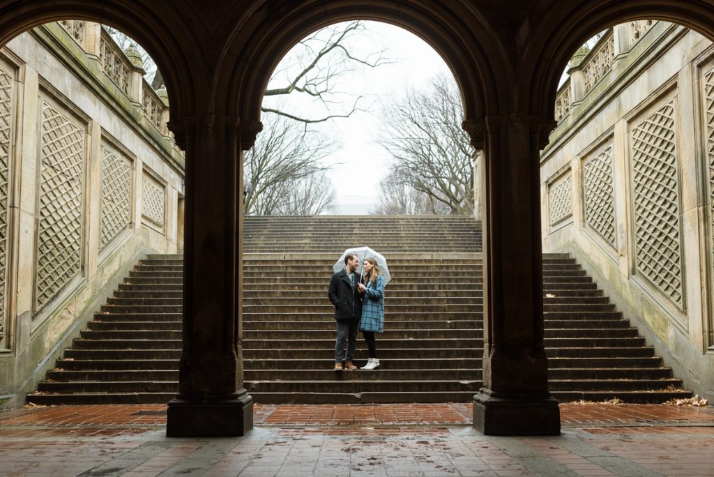 Rainy Central Park sounds go fun and romantic. And Susie and Jesse did exactly that, they got a clear umbrella walked around Central Park NYC laughing and having fun with each other. Susie and Jesse's Central Park NYC captured by MJ from Pearl Paper Studio. Pearl Paper Studio is here to capture real emotions, fun couples with non-traditional wedding stories, now we are booking small intimate backyard wedding, outdoor tent wedding, farm wedding, elopements, nyc elopements. We are currently booking fall 2022 and 2023 weddings in NY, NJ and LI.