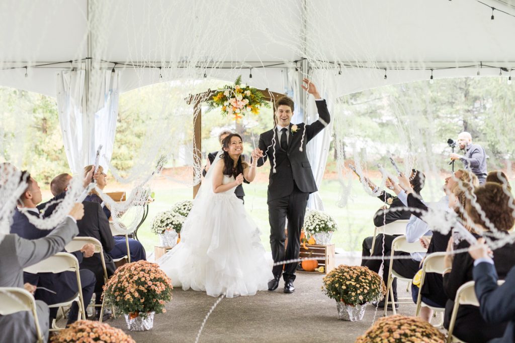 Jenny and Jacob like all the other couples planning for their wedding, planned for the perfect wedding day. And they dreamt that it will come true on their wedding day at Hawk Pointe Golf Club NJ but mother nature had other plans to shower them with love. But little rain did not discourage or stop Jenny and Jacob from having the best time of their life starting with their amazing choreographed first dance then the rest of the reception followed filled with laughters, dancing and drinking. Jenny and Jacob's Hawk Pointe Golf Club NJ Wedding captured by Steve from Pearl Paper Studio. Pearl Paper Studio is here to capture real emotions, fun couples with non-traditional wedding stories, now we are booking small intimate backyard wedding, outdoor tent wedding, farm wedding, elopements, nyc elopements. We are currently booking fall 2022 and 2023 weddings in NY, NJ and LI.