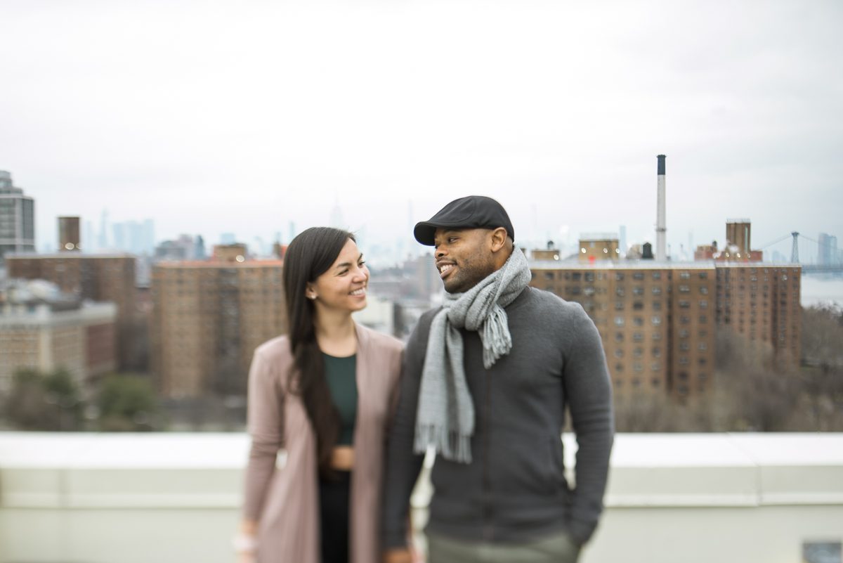 Michelle and George wanted a cozy Brooklyn home session on a rainy day. Michelle and George baked a beer bread and ate it together seated on their couch. They laughed, ate, and talked to each other then we headed up to their rooftop. Got some fresh air, Michelle and George's Brooklyn at home engagement session captures by MJ from Pearl Paper Studio. Pearl Paper Studio is here to capture real emotions, fun couples with non-traditional wedding stories, now we are booking small intimate backyard wedding, outdoor tent wedding, farm wedding, elopements, nyc elopements. We are currently booking fall 2022 and 2023 weddings in NY, NJ and LI.