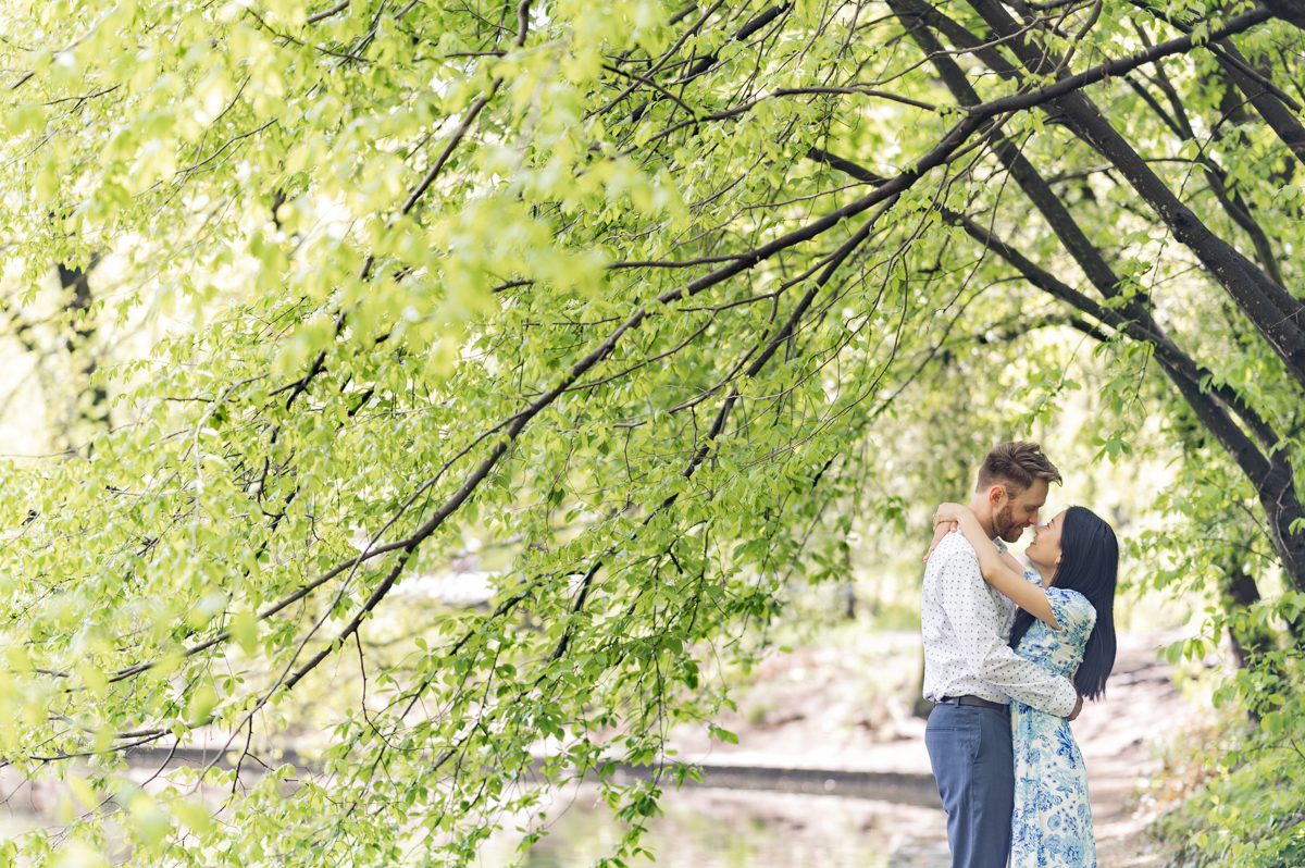 Full Spring is in the air at Prospect Park Brooklyn NY, we walked and wandered around Prospect Park Brooklyn with Susanna and Justin during their engagement session. Susanna and Justin's Prospect Park Brooklyn Engagement captured by MJ from Pearl Paper Studio. Pearl Paper Studio is here to capture real emotions, fun couples with non-traditional wedding stories, now we are booking small intimate backyard wedding, outdoor tent wedding, farm wedding, elopements, nyc elopements. We are currently booking fall 2023 and 2024 weddings in NJ, NY, Brooklyn and Long Island.