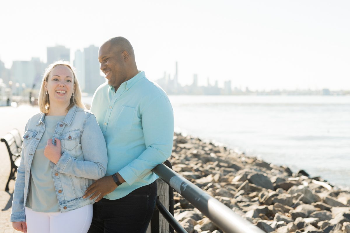 Liberty State Park Jersey City NJ Engagement by Pearl Paper Studio | Laura and Nick Liberty State Park Jersey City NJ Engagement Photographed by NY, LI and NJ Wedding Photography Studio Pearl Paper Studio. Gorgeous sunny spring afternoon perfect day for a stroll around Liberty State Park. Met with Laura and Nick for their engagement session at Liberty State Park in Jersey City overlooking NYC for Laura and Nick's engagement session. Laura and Nick's Liberty State Park Jersey City NJ engagement captured by Steve from Pearl Paper Studio. Pearl Paper Studio is here to capture real emotions, fun couples with non-traditional wedding stories, now we are booking small intimate backyard wedding, outdoor tent wedding, farm wedding, elopements, nyc elopements. We are currently booking fall 2023 and 2024 weddings in NJ, NY, Brooklyn and Long Island.