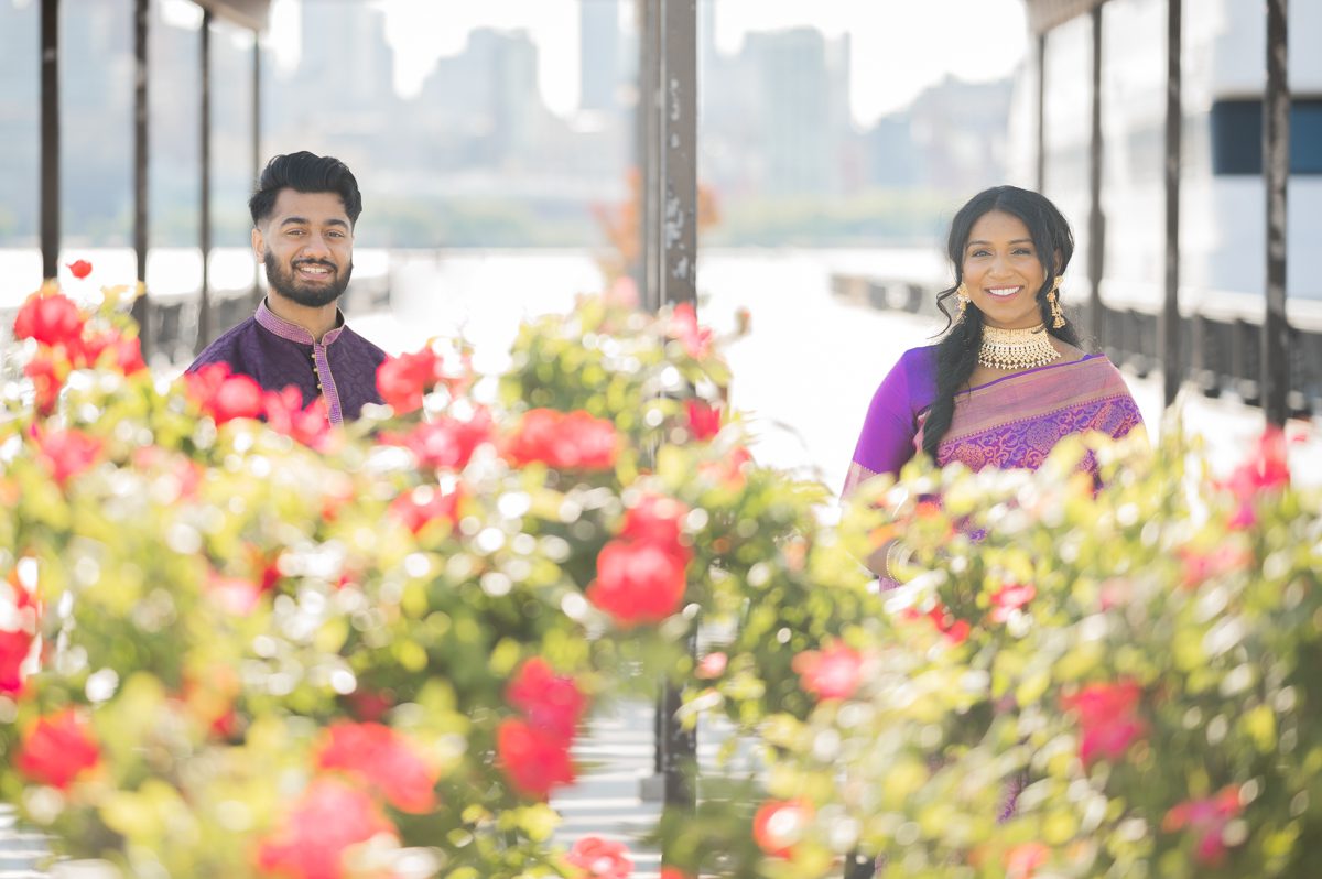 Lovely Hoboken waterfront engagement session with Ashley and Alvin. Ashely and Alvin started the Hoboken engagement session in their Indian traditional outfits then for later half of the Hoboken engagement session Ashley and Alvin changed into a dress and a suit. It was bit bright by Hoboken waterfront but with Ashley and Alvin we had fun exploring different backdrops of Hoboken, NJ. Ashley and Alvin's Hoboken NJ engagement session documented by MJ from Pearl Paper Studio. Pearl Paper Studio is here to capture real emotions, fun couples with non-traditional wedding stories, now we are booking small intimate backyard wedding, outdoor tent wedding, farm wedding, elopements, nyc elopements. We are currently booking fall 2023 and 2024 weddings in NJ, NY, Brooklyn and Long Island.