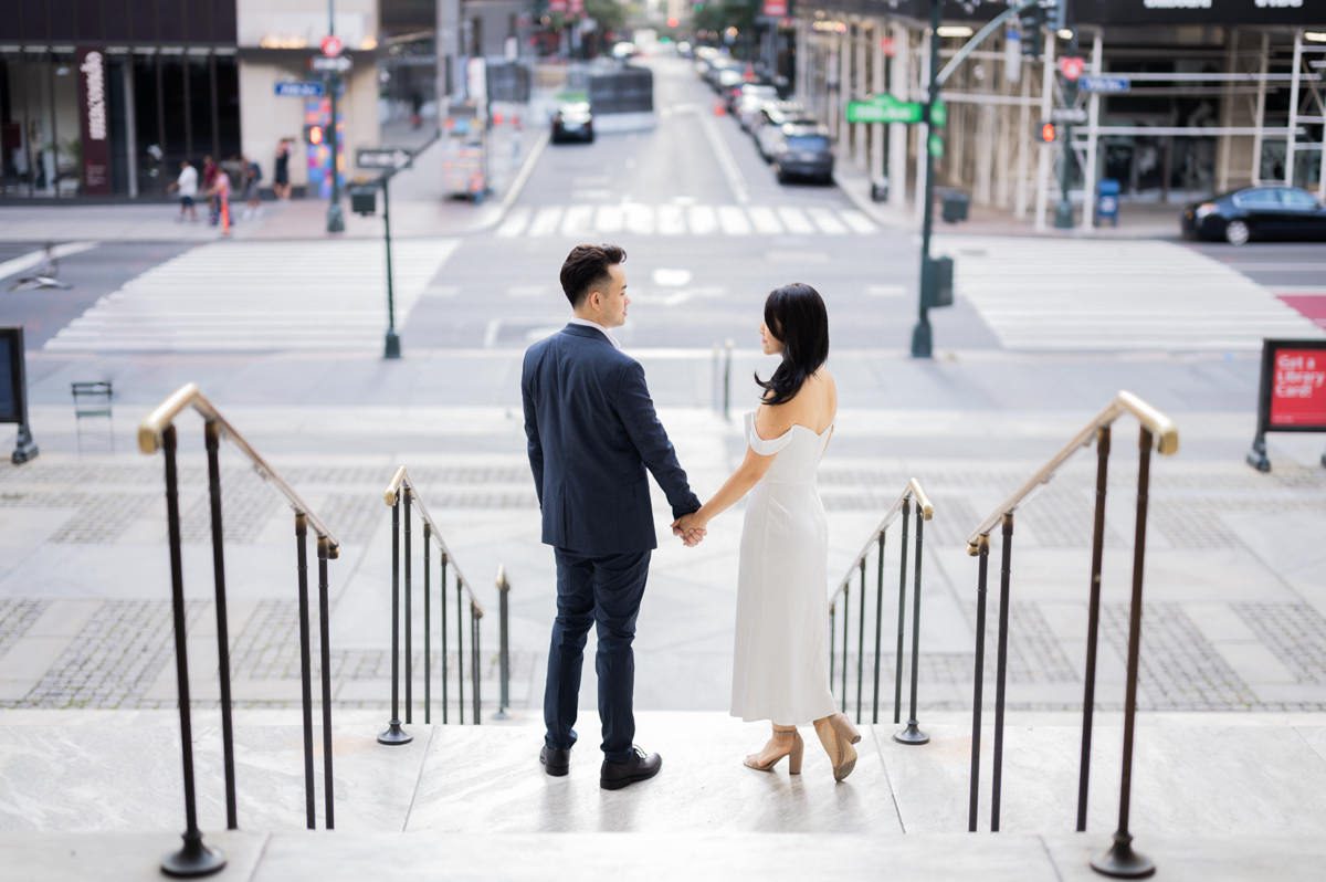 One of the most iconic building in NYC is NY Public Library amongst other buildings in NY. Sophia and Sam started their NYC engagement session at NY Public Library with tall white columns and iconic stairs followed by some subway shot which took them to Central Park. From NY Public Library to Bethesda Arcade, Bethesda Fountain and ending the session with some subway ride back can not be more NY that Sophia and Sam's NYC engagement session. Sophia and Sam's NY Public Library and Central Park engagement documented by MJ from Pearl Paper Studio. Pearl Paper Studio is here to capture real emotions, fun couples with non-traditional wedding stories, now we are booking small intimate backyard wedding, outdoor tent wedding, farm wedding, elopements, nyc elopements. We are currently booking fall 2023 and 2024 weddings in NJ, NY, Brooklyn and Long Island.