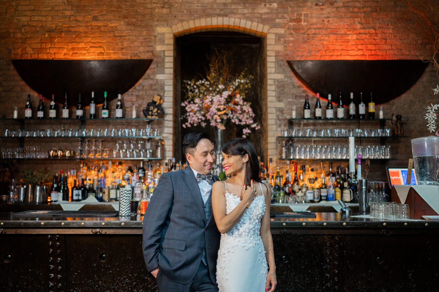 Every wedding is a story, a unique tale of love, joy, and the beginning of a new chapter. Recently, we had the privilege of photographing the beautiful union of Patricia and Michael at the enchanting My Moon in Brooklyn, NY.

My Moon, with its rustic charm and historic allure, provided the perfect backdrop for Patricia and Michael's celebration. Nestled in the heart of Brooklyn, this former boiler room turned chic restaurant exudes warmth and intimacy, making it an ideal setting for a romantic wedding affair. The exposed brick walls, twinkle lights, and cozy ambiance set the stage for a night to remember.

One of the most heartwarming aspects of Patricia and Michael's wedding was the love that surrounded them. From the laughter-filled speech that turned emotional bringing tear to Michael's eyes. It was clear that they were surrounded by an incredible support system of family and friends. The love and joy shared by everyone present truly made the day unforgettable.

Patricia and Michael My Moon Brooklyn NY wedding photographed by Miles from Pearl Paper Studio. Pearl Paper Studio is here to capture real emotions, fun couples with non-traditional wedding stories, now we are booking small intimate backyard wedding, outdoor tent wedding, farm wedding, elopements, nyc elopements. We are currently booking 2024 weddings in NJ, NY, Brooklyn and Long Island.