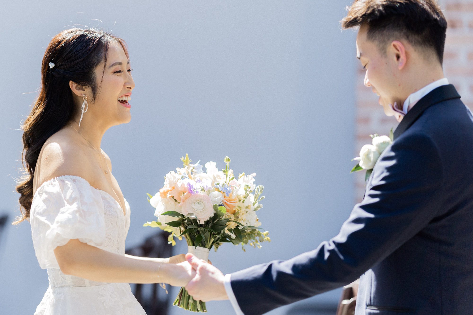 On April 7, 2024, Sophia and Sam tied the knot at the stunning Perona Farms in Andover, NJ. The day was filled with joy, love, and a series of beautiful moments that I was privileged to capture as their photographer.

Sophia and Sam began their day by getting ready on-site at Perona Farms. The air was filled with excitement and anticipation as the couple prepared for their big day. Once they were ready, Sophia and Sam shared an intimate first look on the rooftop of The Reserve, a magical moment framed by the panoramic views. Following this touching moment, they strolled through the picturesque grounds of Perona Farms for their wedding photos, capturing the essence of their love against the backdrop of blooming gardens and rustic charm.

Before the official ceremony, Sophia and Sam honored their heritage with a traditional Chinese Tea Ceremony. During this ceremony, the couple served tea to their elders, who in return presented them with wedding gifts, often gold jewelry, symbolizing prosperity and good fortune. It was a heartwarming tradition that added a meaningful layer to their special day.

With the tea ceremony complete, Sophia took a moment to touch up her makeup and hair, ensuring she was picture-perfect for the upcoming ceremony. Guests gathered on the rooftop of The Reserve, eagerly awaiting the bride and groom. Sam walked in first, his eyes lighting up as he watched Sophia gracefully make her way down the aisle, escorted by her parents and their beloved fur baby. The ceremony was sweet and heartfelt, culminating in a tender kiss that sealed their vows.

The celebration continued with a delightful cocktail hour at Perona Farms, where guests mingled and enjoyed an array of delicious hors d'oeuvres. As the sun began to set, Sophia and Sam kicked off their reception with a choreographed first dance that left everyone in awe. Their graceful movements and evident joy set the tone for an unforgettable evening.

The reception at The Reserve at Perona Farms was a lively affair, filled with laughter, dancing, and joyous celebration. The couple's loved ones joined them on the dance floor, making memories that would last a lifetime. From the heartfelt toasts to the energetic dancing, the night was a perfect reflection of Sophia and Sam's love and commitment to each other.


Sophia and Sam The Reserve Perona Farms Andover NJ Wedding photographed by MJ from Pearl Paper Studio. Pearl Paper Studio is here to capture real emotions, fun couples with non-traditional wedding stories, now we are booking small intimate backyard wedding, outdoor tent wedding, farm wedding, elopements, nyc elopements. We are currently booking 2024 weddings in NJ, NY, Brooklyn and Long Island.