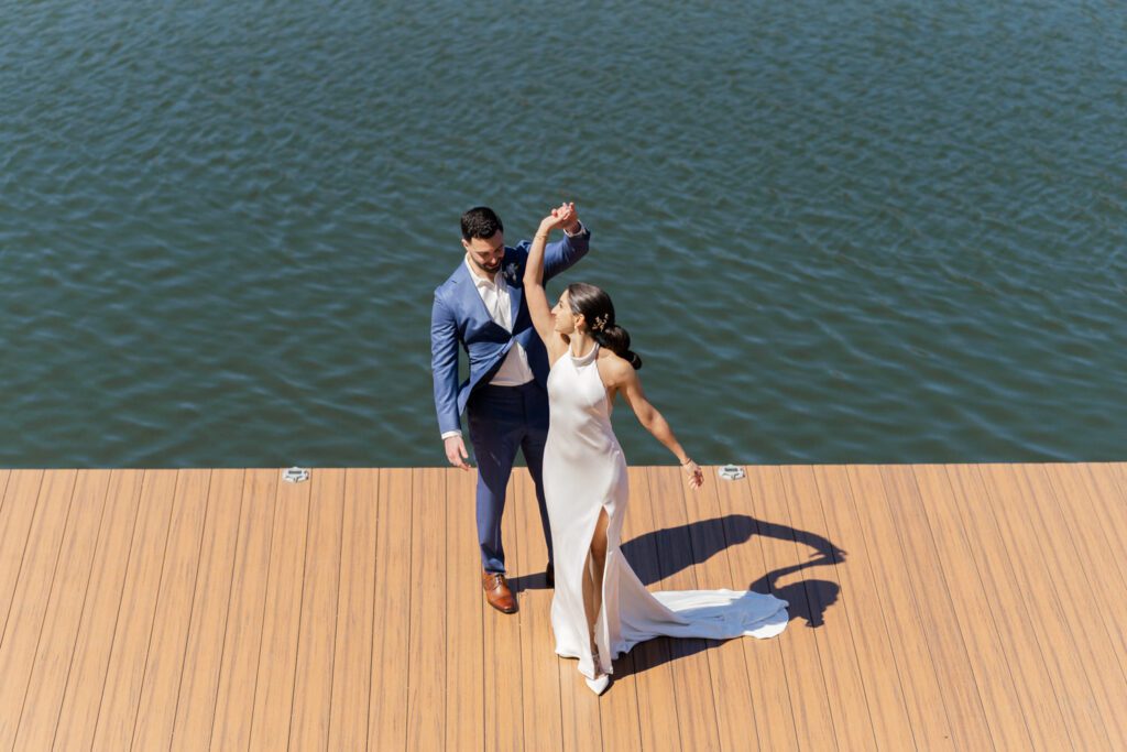 On April 25, I had the pleasure of documenting Gabriella and Joseph's wedding at the beautiful Rock Island Lake Club in Sparta, NJ. The venue provided a stunning backdrop for their special day, starting with Gabriella's elegant entrance in her simple yet stunning Jenny Yoon dress. The moment she walked down the dock for a first look with Joe was nothing short of magical.
Hope and Lilly from Strange Vine Studio truly outdid themselves with the decor. The outdoor ceremony area, set against the serene lake, was a picturesque setting for Gabriella and Joe's vows. Inside, the reception room was equally breathtaking, perfectly adorned to celebrate the newlyweds.
Gabriella and Joe's wedding day was filled with laughter and good vibes, all made even more memorable by the enchanting atmosphere of Rock Island Lake Club. The venue's natural beauty and impeccable amenities provided the perfect setting for this unforgettable celebration.

Gabriella and Joe Rock Island Lake Club Sparta NJ Wedding photographed by Steve from Pearl Paper Studio. Pearl Paper Studio is here to capture real emotions, fun couples with non-traditional wedding stories, now we are booking small intimate backyard wedding, outdoor tent wedding, farm wedding, elopements, nyc elopements. We are currently booking 2024 weddings in NJ, NY, Brooklyn and Long Island.
