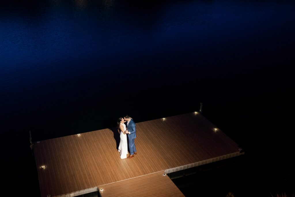 On April 25, I had the pleasure of documenting Gabriella and Joseph's wedding at the beautiful Rock Island Lake Club in Sparta, NJ. The venue provided a stunning backdrop for their special day, starting with Gabriella's elegant entrance in her simple yet stunning Jenny Yoon dress. The moment she walked down the dock for a first look with Joe was nothing short of magical.
Hope and Lilly from Strange Vine Studio truly outdid themselves with the decor. The outdoor ceremony area, set against the serene lake, was a picturesque setting for Gabriella and Joe's vows. Inside, the reception room was equally breathtaking, perfectly adorned to celebrate the newlyweds.
Gabriella and Joe's wedding day was filled with laughter and good vibes, all made even more memorable by the enchanting atmosphere of Rock Island Lake Club. The venue's natural beauty and impeccable amenities provided the perfect setting for this unforgettable celebration.

Gabriella and Joe Rock Island Lake Club Sparta NJ Wedding photographed by Steve from Pearl Paper Studio. Pearl Paper Studio is here to capture real emotions, fun couples with non-traditional wedding stories, now we are booking small intimate backyard wedding, outdoor tent wedding, farm wedding, elopements, nyc elopements. We are currently booking 2024 weddings in NJ, NY, Brooklyn and Long Island.
