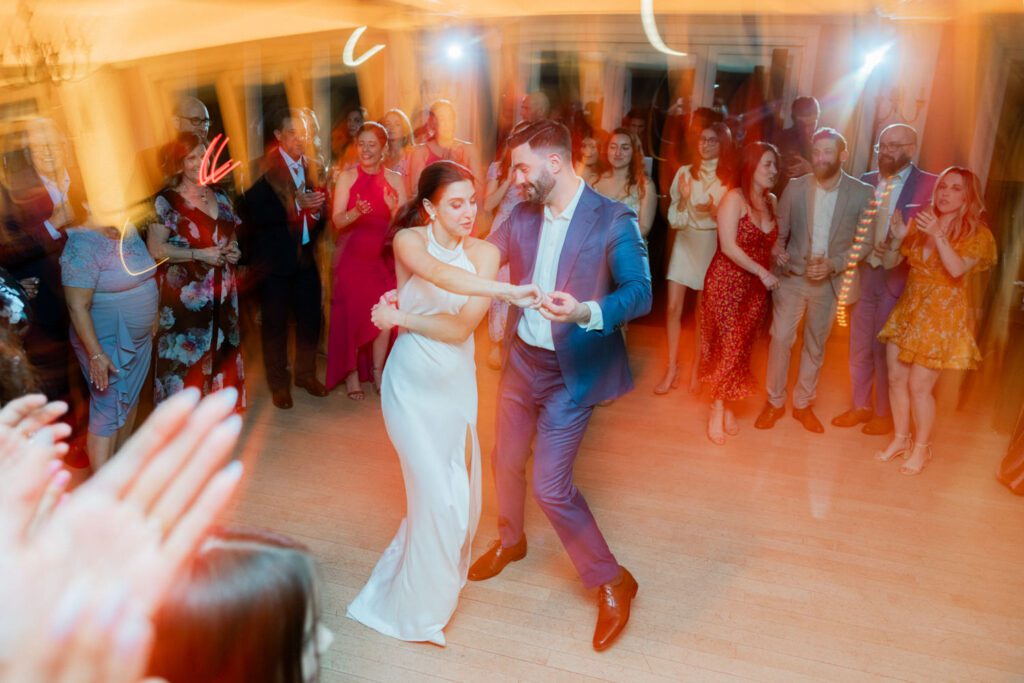 On April 25, I had the pleasure of documenting Gabriella and Joseph's wedding at the beautiful Rock Island Lake Club in Sparta, NJ. The venue provided a stunning backdrop for their special day, starting with Gabriella's elegant entrance in her simple yet stunning Jenny Yoon dress. The moment she walked down the dock for a first look with Joe was nothing short of magical.
Hope and Lilly from Strange Vine Studio truly outdid themselves with the decor. The outdoor ceremony area, set against the serene lake, was a picturesque setting for Gabriella and Joe's vows. Inside, the reception room was equally breathtaking, perfectly adorned to celebrate the newlyweds.
Gabriella and Joe's wedding day was filled with laughter and good vibes, all made even more memorable by the enchanting atmosphere of Rock Island Lake Club. The venue's natural beauty and impeccable amenities provided the perfect setting for this unforgettable celebration.

Gabriella and Joe Rock Island Lake Club Sparta NJ Wedding photographed by Steve from Pearl Paper Studio. Pearl Paper Studio is here to capture real emotions, fun couples with non-traditional wedding stories, now we are booking small intimate backyard wedding, outdoor tent wedding, farm wedding, elopements, nyc elopements. We are currently booking 2024 weddings in NJ, NY, Brooklyn and Long Island.
