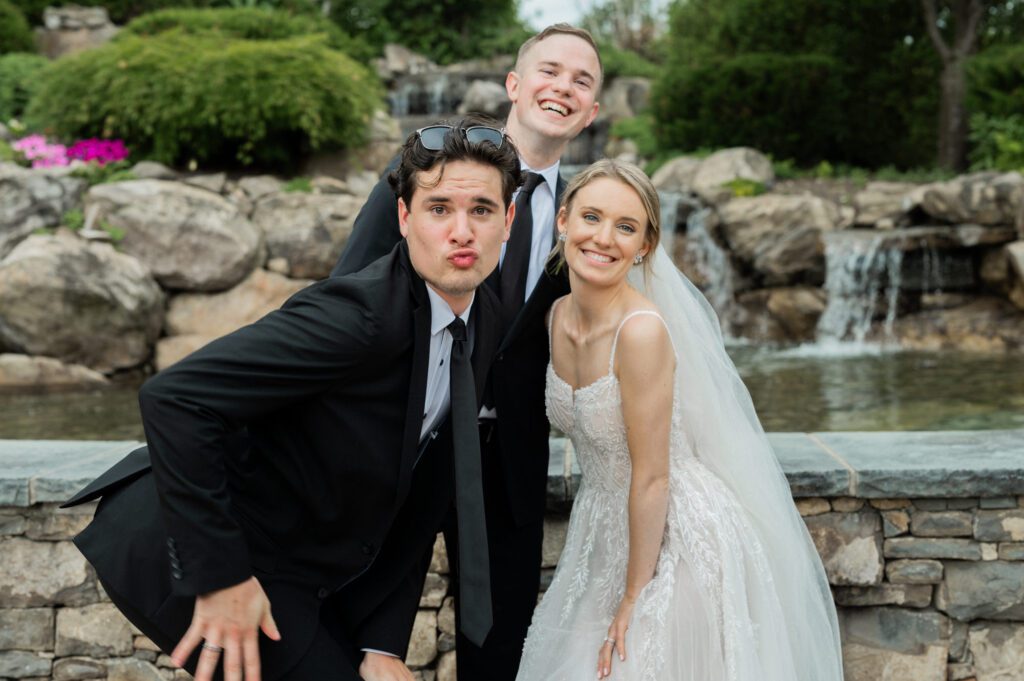 On June 2, 2024, I had the pleasure of photographing the beautiful wedding of Kristen Boonie and Ryan Piscopo at the stunning West Hills Country Club in Middletown, NY. The day was filled with love, joy, and picturesque moments that made for an unforgettable celebration.
Kristen and Ryan shared their first look on the lush green grass of West Hills Country Club, setting the tone for a day full of love and laughter. As we walked around the gorgeous property, we captured their wedding portraits amidst the vibrant blooms that provided a perfect backdrop for their special day.
The outdoor ceremony took place facing the golf course, offering a serene and peaceful view for all the guests. Blessed with amazing weather, the guests enjoyed the outdoors, reveling in the lush green field and the charming water fountain.
As the sun began to set, the reception music by Spin Doctor Entertainment filled the air, and guests moved into the beautifully set up tent. The floral decor by Deja Vu Floral Design added an extra touch of elegance, making the space under the expansive tent shine even more beautifully.
The reception began with Kristen and Ryan making their grand entrance, and the celebration kicked off in high spirits. Surrounded by their family and friends, they celebrated their love and new journey together at the picturesque West Hills Country Club.
West Hills Country Club provided a breathtaking setting for Kristen and Ryan's wedding day, with its lush landscapes, beautiful blooms, and elegant spaces. It was a day to remember, filled with love, laughter, and stunning scenery.
Kristen and Ryan West Hills Country Club NY Wedding photographed by MJ from Pearl Paper Studio. Pearl Paper Studio is here to capture real emotions, fun couples with non-traditional wedding stories, now we are booking small intimate backyard wedding, outdoor tent wedding, farm wedding, elopements, nyc elopements. We are currently booking 2024 weddings in NJ, NY, Brooklyn and Long Island.