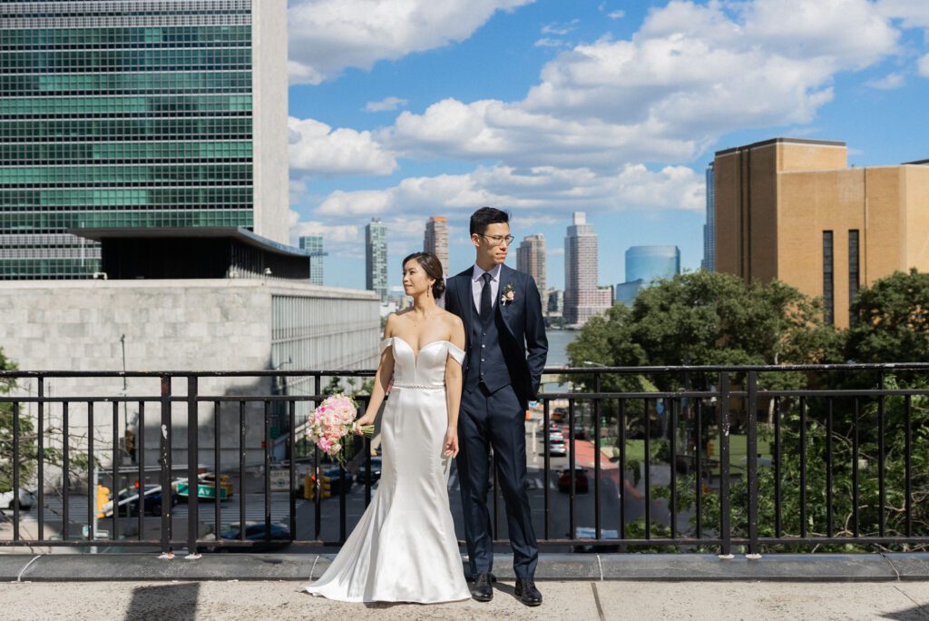 Vivian & Albert’s Stunning NYC Wedding | June 8, 2024

Vivian and Albert’s wedding day was nothing short of magical! It was a perfect blend of elegance, love, and joy in the heart of New York City.

The day began at the chic and modern Thompson Central Park Hotel, where both Vivian and Albert got ready. With its luxurious suites and iconic city views, the hotel provided the perfect backdrop for the early moments of their special day. Vivian looked radiant as she slipped into her stunning gown, while Albert’s classic suit added a timeless charm.

Their first look and formal portraits took place at the serene Tudor City Greens, a hidden gem in Manhattan. This lush urban oasis, surrounded by historic architecture, offered a romantic and intimate setting for their photos. From their heartfelt first look to the joyful family and wedding party portraits, every moment captured the couple’s excitement and love for each other.

After wrapping up the photos around 4:30 PM, the festivities moved to Park Asia in Brooklyn. This spacious and stylish venue seamlessly combines modern elegance with traditional charm, making it an ideal location for Vivian and Albert’s celebration.

The ceremony was heartfelt, with friends and family gathered to witness their vows in an atmosphere filled with love. During the cocktail hour, guests enjoyed a variety of delicious hors d'oeuvres while mingling and sharing laughter. The reception that followed was an unforgettable evening of fantastic food, emotional speeches, and lively dancing.

Vivian and Albert’s wedding day was a beautiful celebration of their love, and I feel so honored to have been a part of it. Congratulations, Vivian and Albert—here’s to a lifetime of happiness together!