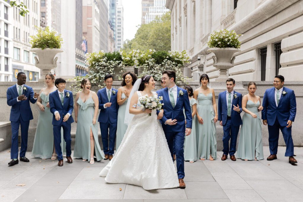 Nikki and Spencer’s wedding day was a perfect blend of heartfelt moments, breathtaking views, and joyous celebration in the heart of Manhattan.
The day began at the Hyatt Herald Square, where both the bride and groom got ready. Before heading out, Nikki and Spencer each shared emotional first-look moments with their parents, setting a beautiful tone for the day ahead.
The couple then made their way to the iconic New York Public Library and Bryant Park for their formal photos. Surrounded by their wedding party and family, the historic architecture and lush park provided a stunning backdrop for capturing unforgettable memories.
The ceremony took place on the rooftop Terrace at Midtown Loft & Terrace. This incredible space, featuring a retractable enclosed rooftop, offers a lush landscaped setting with sweeping 360-degree views of the Manhattan skyline. Guests were treated to vistas of iconic landmarks, including the Empire State Building and Marble Collegiate Church, making the moment even more magical.
After the ceremony, everyone moved indoors to the elegant Loft, which boasts high ceilings and large windows that frame the city’s skyline beautifully. The space perfectly complemented Nikki and Spencer’s vision for their wedding, providing a warm and stylish setting for the evening’s festivities.
The newlyweds shared laughter, happy tears, and countless unforgettable moments with their friends and family. As the night unfolded, the dance floor was alive with celebration, marking the perfect end to Nikki and Spencer’s extraordinary day at Midtown Loft & Terrace.
Congratulations, Nikki and Spencer! Your wedding was a true reflection of your love and joy, and I’m so honored to have captured it all.
Nikki and Spencer Midtown Loft and Terrace NY Wedding photographed by MJ from Pearl Paper Studio. Pearl Paper Studio is here to capture real emotions, fun couples with non-traditional wedding stories, now we are booking small intimate backyard wedding, outdoor tent wedding, farm wedding, elopements, nyc elopements. We are currently booking 2025 and 2026 weddings in NJ, Manhattan, Hudson Valley NY, Brooklyn and Long Island.