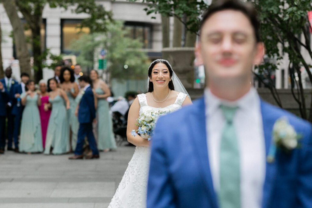 Nikki and Spencer’s wedding day was a perfect blend of heartfelt moments, breathtaking views, and joyous celebration in the heart of Manhattan.
The day began at the Hyatt Herald Square, where both the bride and groom got ready. Before heading out, Nikki and Spencer each shared emotional first-look moments with their parents, setting a beautiful tone for the day ahead.
The couple then made their way to the iconic New York Public Library and Bryant Park for their formal photos. Surrounded by their wedding party and family, the historic architecture and lush park provided a stunning backdrop for capturing unforgettable memories.
The ceremony took place on the rooftop Terrace at Midtown Loft & Terrace. This incredible space, featuring a retractable enclosed rooftop, offers a lush landscaped setting with sweeping 360-degree views of the Manhattan skyline. Guests were treated to vistas of iconic landmarks, including the Empire State Building and Marble Collegiate Church, making the moment even more magical.
After the ceremony, everyone moved indoors to the elegant Loft, which boasts high ceilings and large windows that frame the city’s skyline beautifully. The space perfectly complemented Nikki and Spencer’s vision for their wedding, providing a warm and stylish setting for the evening’s festivities.
The newlyweds shared laughter, happy tears, and countless unforgettable moments with their friends and family. As the night unfolded, the dance floor was alive with celebration, marking the perfect end to Nikki and Spencer’s extraordinary day at Midtown Loft & Terrace.
Congratulations, Nikki and Spencer! Your wedding was a true reflection of your love and joy, and I’m so honored to have captured it all.
Nikki and Spencer Midtown Loft and Terrace NY Wedding photographed by MJ from Pearl Paper Studio. Pearl Paper Studio is here to capture real emotions, fun couples with non-traditional wedding stories, now we are booking small intimate backyard wedding, outdoor tent wedding, farm wedding, elopements, nyc elopements. We are currently booking 2025 and 2026 weddings in NJ, Manhattan, Hudson Valley NY, Brooklyn and Long Island.