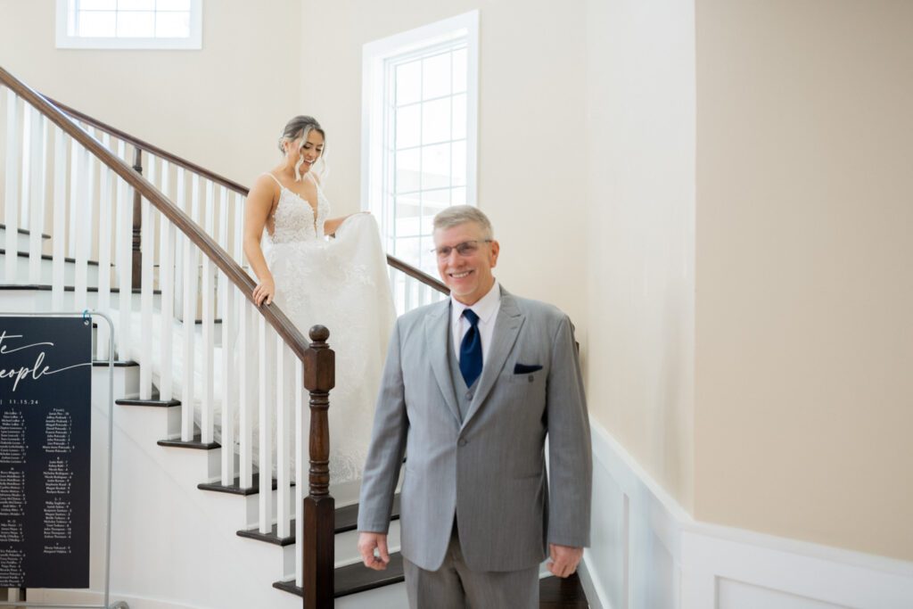 Emily and Frank Rock Island Lake Club, NJ 
Winter weddings are magical, and Emily and Frank’s November celebration at Rock Island Lake Club in Sparta, NJ, was the perfect example of just how enchanting they can be! Who says winter weddings can’t be fun? Despite the chilly weather, their special day was filled with warmth, laughter, and love—a true testament to their joyful spirits and the magic of this incredible venue.
Emily and Frank embraced the crisp November air with an outdoor ceremony by the picturesque lake at Rock Island Lake Club. The serene water, framed by the natural beauty of the surrounding landscape, created an unforgettable backdrop for their vows. Guests bundled up in cozy wraps and blankets, their smiles radiating as they witnessed the couple’s heartfelt promises. The venue’s dedicated team ensured every detail was perfectly executed, making the ceremony seamless.
After the ceremony, the celebration continued with one of the best cocktail hours in all of New Jersey. Rock Island Lake Club is renowned for its exceptional cuisine and creative presentation, and this event was no exception. Guests enjoyed an array of delicious hors d’oeuvres and drinks while mingling in the warm and inviting indoor spaces, thoughtfully designed to complement the venue’s lakeside charm.
The reception was a lively affair, with the dance floor packed from the first song to the last. Friends and family came together to celebrate Emily and Frank’s love, creating an atmosphere of pure joy. The stunning reception room at Rock Island Lake Club, with its elegant décor and large windows overlooking the lake, provided the perfect setting for a night of dancing, laughter, and unforgettable memories.
Rock Island Lake Club truly excels at hosting weddings year-round, but winter weddings here have a special kind of magic. From the attentive staff to the breathtaking views, every aspect of this venue enhances the celebration. Emily and Frank’s wedding day is proof that even on the coldest days, love and happiness can shine brighter than ever.
If you’re considering a winter wedding, Rock Island Lake Club is the perfect venue to bring your vision to life. Emily and Frank’s celebration was a testament to the beauty of the season and the power of love to warm even the chilliest of days.
Emily and Frank Rock Island Lake Club NJ Wedding photographed by Steve from Pearl Paper Studio. Pearl Paper Studio is here to capture real emotions, fun couples with non-traditional wedding stories, now we are booking small intimate backyard wedding, outdoor tent wedding, farm wedding, elopements, nyc elopements. We are currently booking 2025 and 2026 weddings in NJ, Manhattan, Hudson Valley NY, Brooklyn and Long Island.
