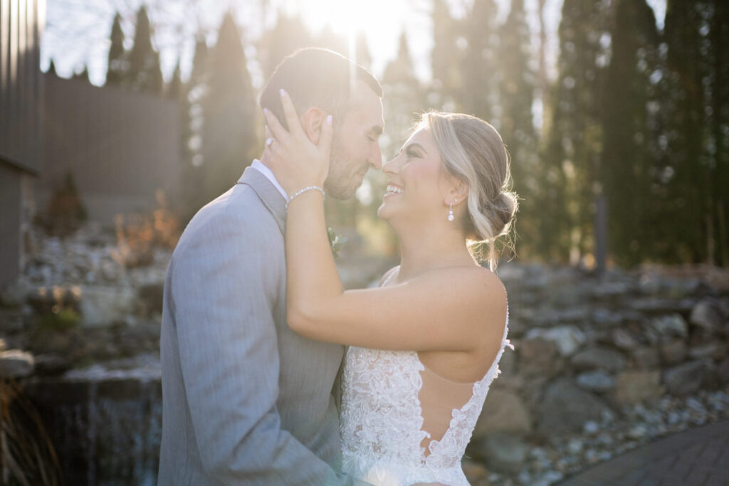 Emily and Frank Rock Island Lake Club, NJ 
Winter weddings are magical, and Emily and Frank’s November celebration at Rock Island Lake Club in Sparta, NJ, was the perfect example of just how enchanting they can be! Who says winter weddings can’t be fun? Despite the chilly weather, their special day was filled with warmth, laughter, and love—a true testament to their joyful spirits and the magic of this incredible venue.
Emily and Frank embraced the crisp November air with an outdoor ceremony by the picturesque lake at Rock Island Lake Club. The serene water, framed by the natural beauty of the surrounding landscape, created an unforgettable backdrop for their vows. Guests bundled up in cozy wraps and blankets, their smiles radiating as they witnessed the couple’s heartfelt promises. The venue’s dedicated team ensured every detail was perfectly executed, making the ceremony seamless.
After the ceremony, the celebration continued with one of the best cocktail hours in all of New Jersey. Rock Island Lake Club is renowned for its exceptional cuisine and creative presentation, and this event was no exception. Guests enjoyed an array of delicious hors d’oeuvres and drinks while mingling in the warm and inviting indoor spaces, thoughtfully designed to complement the venue’s lakeside charm.
The reception was a lively affair, with the dance floor packed from the first song to the last. Friends and family came together to celebrate Emily and Frank’s love, creating an atmosphere of pure joy. The stunning reception room at Rock Island Lake Club, with its elegant décor and large windows overlooking the lake, provided the perfect setting for a night of dancing, laughter, and unforgettable memories.
Rock Island Lake Club truly excels at hosting weddings year-round, but winter weddings here have a special kind of magic. From the attentive staff to the breathtaking views, every aspect of this venue enhances the celebration. Emily and Frank’s wedding day is proof that even on the coldest days, love and happiness can shine brighter than ever.
If you’re considering a winter wedding, Rock Island Lake Club is the perfect venue to bring your vision to life. Emily and Frank’s celebration was a testament to the beauty of the season and the power of love to warm even the chilliest of days.
Emily and Frank Rock Island Lake Club NJ Wedding photographed by Steve from Pearl Paper Studio. Pearl Paper Studio is here to capture real emotions, fun couples with non-traditional wedding stories, now we are booking small intimate backyard wedding, outdoor tent wedding, farm wedding, elopements, nyc elopements. We are currently booking 2025 and 2026 weddings in NJ, Manhattan, Hudson Valley NY, Brooklyn and Long Island.
