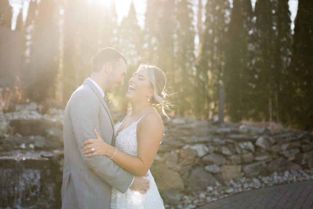 Emily and Frank Rock Island Lake Club, NJ 
Winter weddings are magical, and Emily and Frank’s November celebration at Rock Island Lake Club in Sparta, NJ, was the perfect example of just how enchanting they can be! Who says winter weddings can’t be fun? Despite the chilly weather, their special day was filled with warmth, laughter, and love—a true testament to their joyful spirits and the magic of this incredible venue.
Emily and Frank embraced the crisp November air with an outdoor ceremony by the picturesque lake at Rock Island Lake Club. The serene water, framed by the natural beauty of the surrounding landscape, created an unforgettable backdrop for their vows. Guests bundled up in cozy wraps and blankets, their smiles radiating as they witnessed the couple’s heartfelt promises. The venue’s dedicated team ensured every detail was perfectly executed, making the ceremony seamless.
After the ceremony, the celebration continued with one of the best cocktail hours in all of New Jersey. Rock Island Lake Club is renowned for its exceptional cuisine and creative presentation, and this event was no exception. Guests enjoyed an array of delicious hors d’oeuvres and drinks while mingling in the warm and inviting indoor spaces, thoughtfully designed to complement the venue’s lakeside charm.
The reception was a lively affair, with the dance floor packed from the first song to the last. Friends and family came together to celebrate Emily and Frank’s love, creating an atmosphere of pure joy. The stunning reception room at Rock Island Lake Club, with its elegant décor and large windows overlooking the lake, provided the perfect setting for a night of dancing, laughter, and unforgettable memories.
Rock Island Lake Club truly excels at hosting weddings year-round, but winter weddings here have a special kind of magic. From the attentive staff to the breathtaking views, every aspect of this venue enhances the celebration. Emily and Frank’s wedding day is proof that even on the coldest days, love and happiness can shine brighter than ever.
If you’re considering a winter wedding, Rock Island Lake Club is the perfect venue to bring your vision to life. Emily and Frank’s celebration was a testament to the beauty of the season and the power of love to warm even the chilliest of days.
Emily and Frank Rock Island Lake Club NJ Wedding photographed by Steve from Pearl Paper Studio. Pearl Paper Studio is here to capture real emotions, fun couples with non-traditional wedding stories, now we are booking small intimate backyard wedding, outdoor tent wedding, farm wedding, elopements, nyc elopements. We are currently booking 2025 and 2026 weddings in NJ, Manhattan, Hudson Valley NY, Brooklyn and Long Island.
