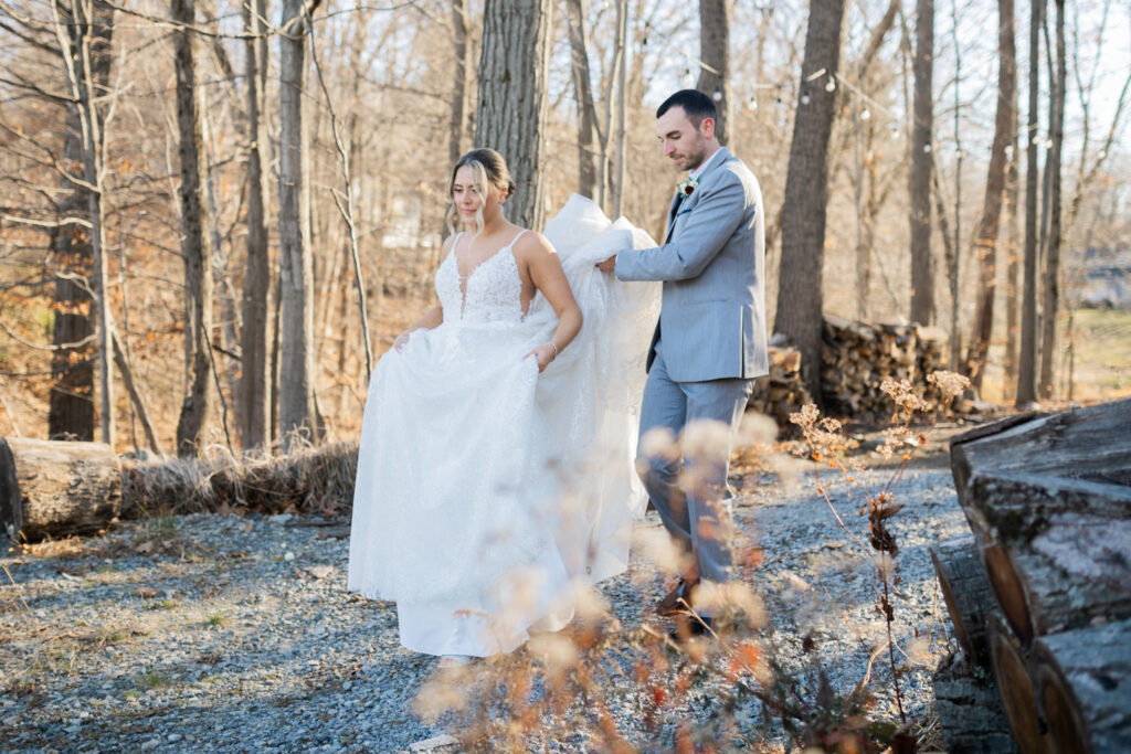 Emily and Frank Rock Island Lake Club, NJ 
Winter weddings are magical, and Emily and Frank’s November celebration at Rock Island Lake Club in Sparta, NJ, was the perfect example of just how enchanting they can be! Who says winter weddings can’t be fun? Despite the chilly weather, their special day was filled with warmth, laughter, and love—a true testament to their joyful spirits and the magic of this incredible venue.
Emily and Frank embraced the crisp November air with an outdoor ceremony by the picturesque lake at Rock Island Lake Club. The serene water, framed by the natural beauty of the surrounding landscape, created an unforgettable backdrop for their vows. Guests bundled up in cozy wraps and blankets, their smiles radiating as they witnessed the couple’s heartfelt promises. The venue’s dedicated team ensured every detail was perfectly executed, making the ceremony seamless.
After the ceremony, the celebration continued with one of the best cocktail hours in all of New Jersey. Rock Island Lake Club is renowned for its exceptional cuisine and creative presentation, and this event was no exception. Guests enjoyed an array of delicious hors d’oeuvres and drinks while mingling in the warm and inviting indoor spaces, thoughtfully designed to complement the venue’s lakeside charm.
The reception was a lively affair, with the dance floor packed from the first song to the last. Friends and family came together to celebrate Emily and Frank’s love, creating an atmosphere of pure joy. The stunning reception room at Rock Island Lake Club, with its elegant décor and large windows overlooking the lake, provided the perfect setting for a night of dancing, laughter, and unforgettable memories.
Rock Island Lake Club truly excels at hosting weddings year-round, but winter weddings here have a special kind of magic. From the attentive staff to the breathtaking views, every aspect of this venue enhances the celebration. Emily and Frank’s wedding day is proof that even on the coldest days, love and happiness can shine brighter than ever.
If you’re considering a winter wedding, Rock Island Lake Club is the perfect venue to bring your vision to life. Emily and Frank’s celebration was a testament to the beauty of the season and the power of love to warm even the chilliest of days.
Emily and Frank Rock Island Lake Club NJ Wedding photographed by Steve from Pearl Paper Studio. Pearl Paper Studio is here to capture real emotions, fun couples with non-traditional wedding stories, now we are booking small intimate backyard wedding, outdoor tent wedding, farm wedding, elopements, nyc elopements. We are currently booking 2025 and 2026 weddings in NJ, Manhattan, Hudson Valley NY, Brooklyn and Long Island.
