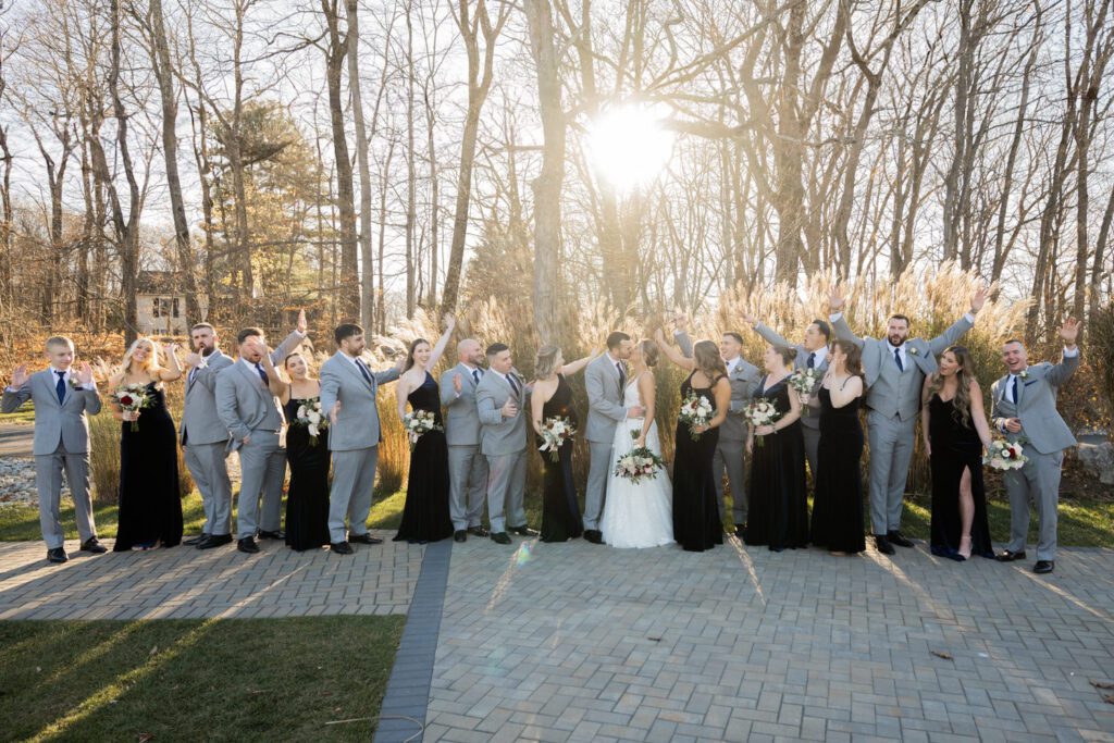 Emily and Frank Rock Island Lake Club, NJ 
Winter weddings are magical, and Emily and Frank’s November celebration at Rock Island Lake Club in Sparta, NJ, was the perfect example of just how enchanting they can be! Who says winter weddings can’t be fun? Despite the chilly weather, their special day was filled with warmth, laughter, and love—a true testament to their joyful spirits and the magic of this incredible venue.
Emily and Frank embraced the crisp November air with an outdoor ceremony by the picturesque lake at Rock Island Lake Club. The serene water, framed by the natural beauty of the surrounding landscape, created an unforgettable backdrop for their vows. Guests bundled up in cozy wraps and blankets, their smiles radiating as they witnessed the couple’s heartfelt promises. The venue’s dedicated team ensured every detail was perfectly executed, making the ceremony seamless.
After the ceremony, the celebration continued with one of the best cocktail hours in all of New Jersey. Rock Island Lake Club is renowned for its exceptional cuisine and creative presentation, and this event was no exception. Guests enjoyed an array of delicious hors d’oeuvres and drinks while mingling in the warm and inviting indoor spaces, thoughtfully designed to complement the venue’s lakeside charm.
The reception was a lively affair, with the dance floor packed from the first song to the last. Friends and family came together to celebrate Emily and Frank’s love, creating an atmosphere of pure joy. The stunning reception room at Rock Island Lake Club, with its elegant décor and large windows overlooking the lake, provided the perfect setting for a night of dancing, laughter, and unforgettable memories.
Rock Island Lake Club truly excels at hosting weddings year-round, but winter weddings here have a special kind of magic. From the attentive staff to the breathtaking views, every aspect of this venue enhances the celebration. Emily and Frank’s wedding day is proof that even on the coldest days, love and happiness can shine brighter than ever.
If you’re considering a winter wedding, Rock Island Lake Club is the perfect venue to bring your vision to life. Emily and Frank’s celebration was a testament to the beauty of the season and the power of love to warm even the chilliest of days.
Emily and Frank Rock Island Lake Club NJ Wedding photographed by Steve from Pearl Paper Studio. Pearl Paper Studio is here to capture real emotions, fun couples with non-traditional wedding stories, now we are booking small intimate backyard wedding, outdoor tent wedding, farm wedding, elopements, nyc elopements. We are currently booking 2025 and 2026 weddings in NJ, Manhattan, Hudson Valley NY, Brooklyn and Long Island.
