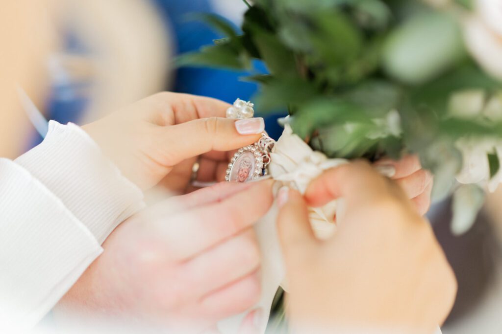 Emily and Frank Rock Island Lake Club, NJ 
Winter weddings are magical, and Emily and Frank’s November celebration at Rock Island Lake Club in Sparta, NJ, was the perfect example of just how enchanting they can be! Who says winter weddings can’t be fun? Despite the chilly weather, their special day was filled with warmth, laughter, and love—a true testament to their joyful spirits and the magic of this incredible venue.
Emily and Frank embraced the crisp November air with an outdoor ceremony by the picturesque lake at Rock Island Lake Club. The serene water, framed by the natural beauty of the surrounding landscape, created an unforgettable backdrop for their vows. Guests bundled up in cozy wraps and blankets, their smiles radiating as they witnessed the couple’s heartfelt promises. The venue’s dedicated team ensured every detail was perfectly executed, making the ceremony seamless.
After the ceremony, the celebration continued with one of the best cocktail hours in all of New Jersey. Rock Island Lake Club is renowned for its exceptional cuisine and creative presentation, and this event was no exception. Guests enjoyed an array of delicious hors d’oeuvres and drinks while mingling in the warm and inviting indoor spaces, thoughtfully designed to complement the venue’s lakeside charm.
The reception was a lively affair, with the dance floor packed from the first song to the last. Friends and family came together to celebrate Emily and Frank’s love, creating an atmosphere of pure joy. The stunning reception room at Rock Island Lake Club, with its elegant décor and large windows overlooking the lake, provided the perfect setting for a night of dancing, laughter, and unforgettable memories.
Rock Island Lake Club truly excels at hosting weddings year-round, but winter weddings here have a special kind of magic. From the attentive staff to the breathtaking views, every aspect of this venue enhances the celebration. Emily and Frank’s wedding day is proof that even on the coldest days, love and happiness can shine brighter than ever.
If you’re considering a winter wedding, Rock Island Lake Club is the perfect venue to bring your vision to life. Emily and Frank’s celebration was a testament to the beauty of the season and the power of love to warm even the chilliest of days.
Emily and Frank Rock Island Lake Club NJ Wedding photographed by Steve from Pearl Paper Studio. Pearl Paper Studio is here to capture real emotions, fun couples with non-traditional wedding stories, now we are booking small intimate backyard wedding, outdoor tent wedding, farm wedding, elopements, nyc elopements. We are currently booking 2025 and 2026 weddings in NJ, Manhattan, Hudson Valley NY, Brooklyn and Long Island.
