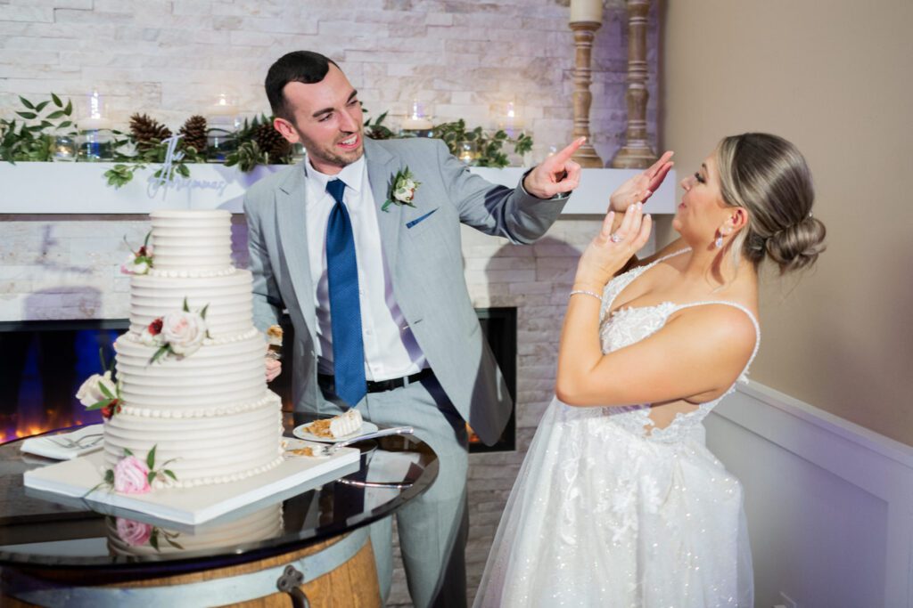 Emily and Frank Rock Island Lake Club, NJ 
Winter weddings are magical, and Emily and Frank’s November celebration at Rock Island Lake Club in Sparta, NJ, was the perfect example of just how enchanting they can be! Who says winter weddings can’t be fun? Despite the chilly weather, their special day was filled with warmth, laughter, and love—a true testament to their joyful spirits and the magic of this incredible venue.
Emily and Frank embraced the crisp November air with an outdoor ceremony by the picturesque lake at Rock Island Lake Club. The serene water, framed by the natural beauty of the surrounding landscape, created an unforgettable backdrop for their vows. Guests bundled up in cozy wraps and blankets, their smiles radiating as they witnessed the couple’s heartfelt promises. The venue’s dedicated team ensured every detail was perfectly executed, making the ceremony seamless.
After the ceremony, the celebration continued with one of the best cocktail hours in all of New Jersey. Rock Island Lake Club is renowned for its exceptional cuisine and creative presentation, and this event was no exception. Guests enjoyed an array of delicious hors d’oeuvres and drinks while mingling in the warm and inviting indoor spaces, thoughtfully designed to complement the venue’s lakeside charm.
The reception was a lively affair, with the dance floor packed from the first song to the last. Friends and family came together to celebrate Emily and Frank’s love, creating an atmosphere of pure joy. The stunning reception room at Rock Island Lake Club, with its elegant décor and large windows overlooking the lake, provided the perfect setting for a night of dancing, laughter, and unforgettable memories.
Rock Island Lake Club truly excels at hosting weddings year-round, but winter weddings here have a special kind of magic. From the attentive staff to the breathtaking views, every aspect of this venue enhances the celebration. Emily and Frank’s wedding day is proof that even on the coldest days, love and happiness can shine brighter than ever.
If you’re considering a winter wedding, Rock Island Lake Club is the perfect venue to bring your vision to life. Emily and Frank’s celebration was a testament to the beauty of the season and the power of love to warm even the chilliest of days.
Emily and Frank Rock Island Lake Club NJ Wedding photographed by Steve from Pearl Paper Studio. Pearl Paper Studio is here to capture real emotions, fun couples with non-traditional wedding stories, now we are booking small intimate backyard wedding, outdoor tent wedding, farm wedding, elopements, nyc elopements. We are currently booking 2025 and 2026 weddings in NJ, Manhattan, Hudson Valley NY, Brooklyn and Long Island.
