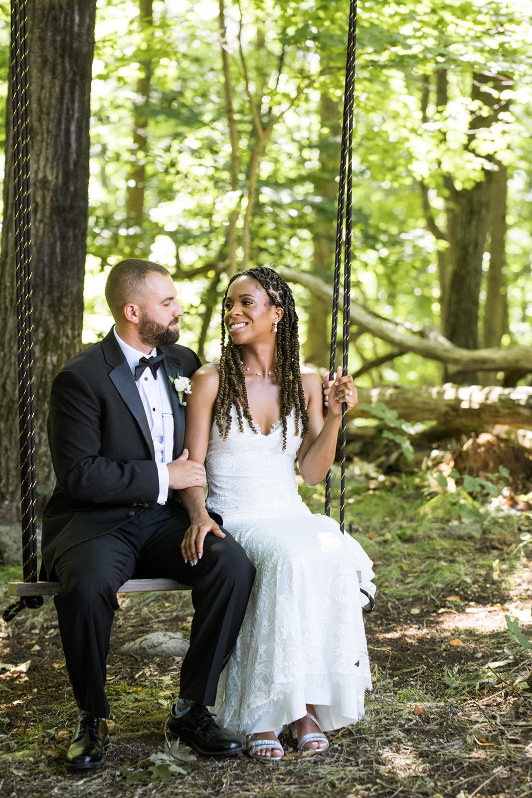 Olivia and Ronald posing together near the lake at Rock Island Lake Club.